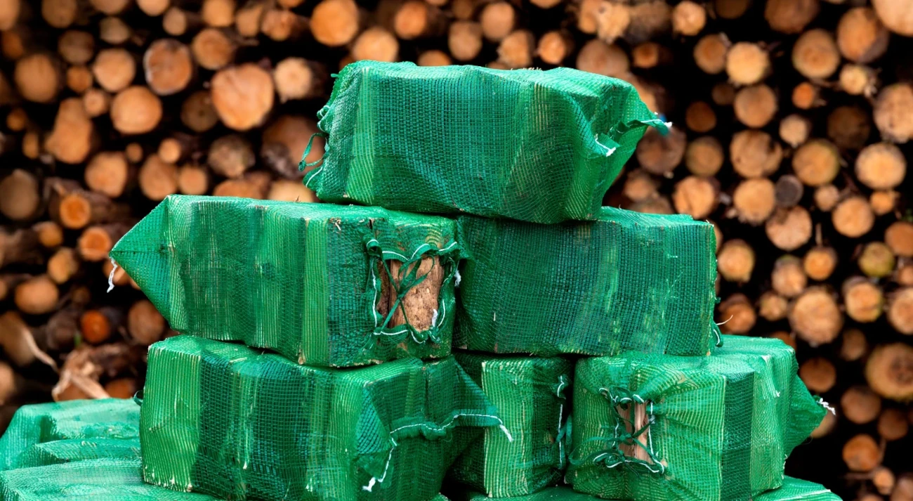 Firewood logs in net bags